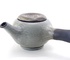 Yokode Kyūhu - theepot van zwarte klei met winterwit glazuur