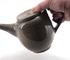 Theepot met transparant glazuur op grijze spikkelklei